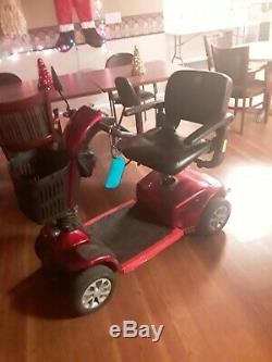 Champion Wheel Chair Scooter, excellent condition, front basket, rear view mirro