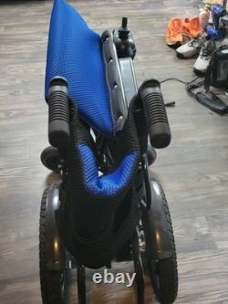 Electric Wheelchair in great condition. Black with blue material