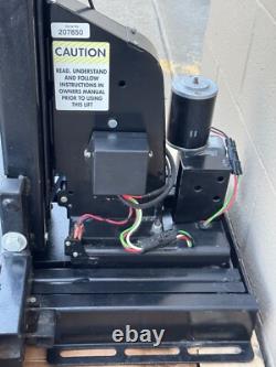 Harmar AL600 Hybrid Electric Wheelchair Scooter Platform Lift inside Vehicle