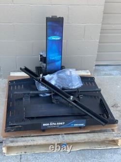 Harmar AL600 Hybrid Electric Wheelchair Scooter Platform Lift inside Vehicle