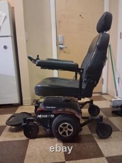 Metris XXL Motorized medical wheelchair/scooter, red in color