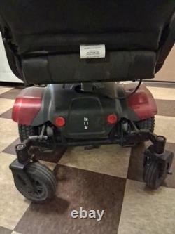 Metris XXL Motorized medical wheelchair/scooter, red in color