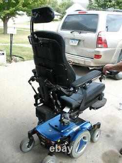Permobile M300 Power Wheel Chair and Harmar Al500 Lift with Swing out Curbside