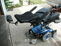 Permobile M300 Power Wheel Chair and Harmar Al500 Lift with Swing out Curbside