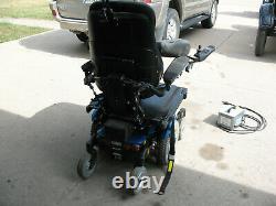 Permobile M300 Power Wheel Chair and Harmar Al500 Lift with Swing out Curbside