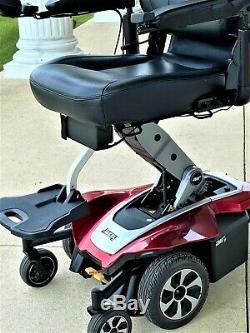 Power wheelchair Air Jazzy 2 lifts 12 in. To bring rider to eye level- awesome