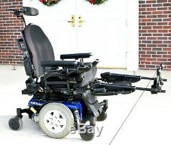 Power wheelchair Quantum Q6edge has tilt-separate feet lift brand new batteries