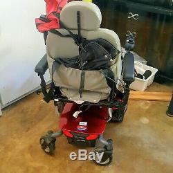 The Scooter Store's Pride Mobility TSS-300 Red Electric Wheelchair 19x18 Seat