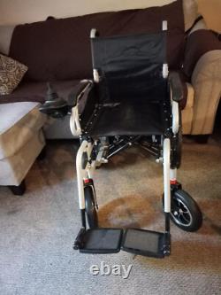 Fauteuil roulant électrique pliant peu utilisé
