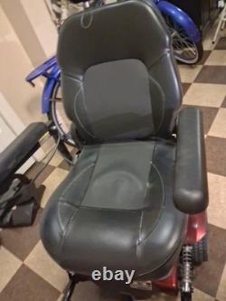 Fauteuil roulant/scooter médical motorisé Metris XXL, de couleur rouge