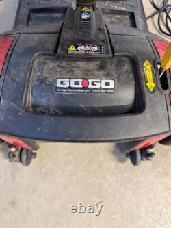 Scooter de voyage Go-Go Elite de Pride Mobility utilisé avec (2) batteries supplémentaires de 22 ah